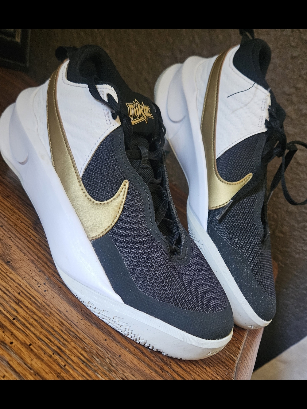 Nike Women’s Black White Gold Low-Top Sneakers